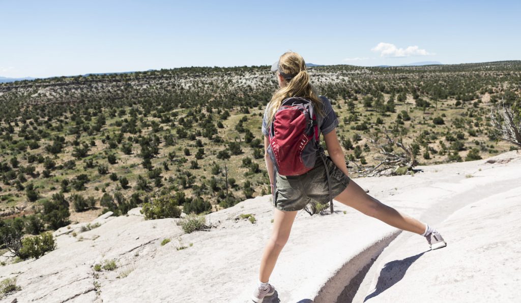 hiker overlooking Sierra Vista trail in New Mexico